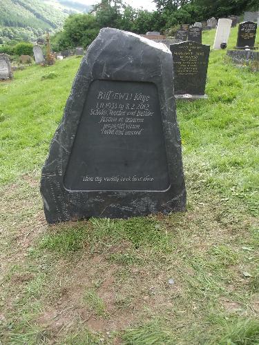 Craven Arms Memorials A natural shaped slate headstone selected by the customer from the Corris Quarry in Mid Wales, includes hand cut lettering and rebated panel.